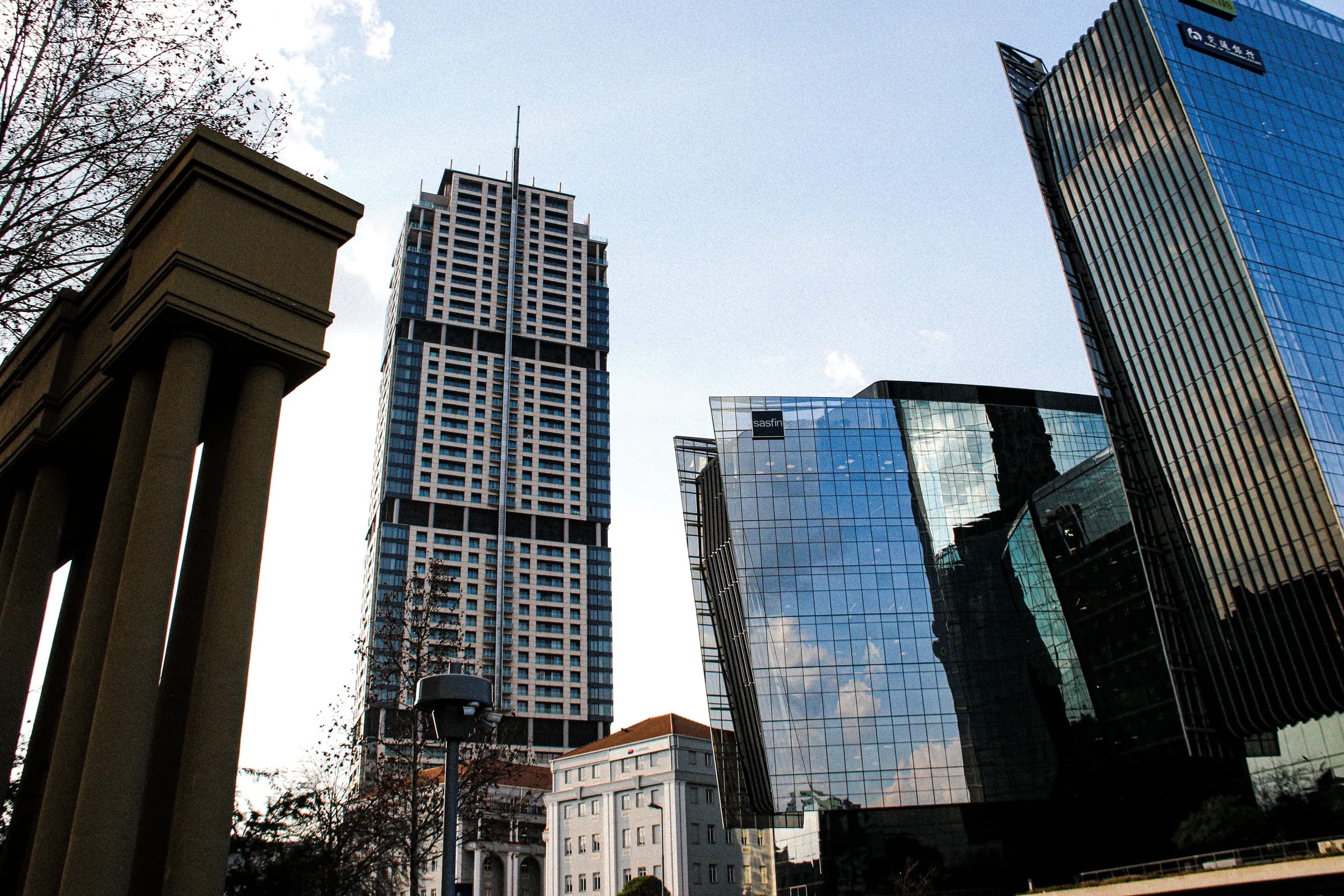 Reflective glass office towers rising over Sandton